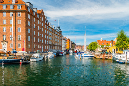 Canvas Print Christianshavn channel with colorful buildings and boats in Copenhagen, Denmark