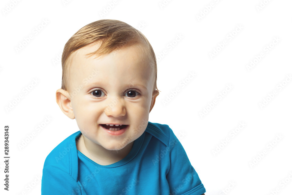 Portrait of cute baby boy isolated on the white background. Copy space. One year boy with first teeth Portrait of cute baby boy isolated on the white background. Copy space. One year boy with first teeth