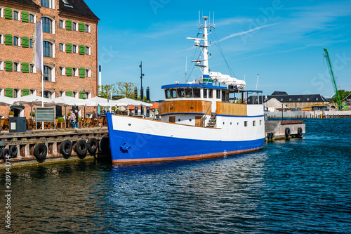 Boat at Havnepromenade on Copenhagen Harbor in Denmark