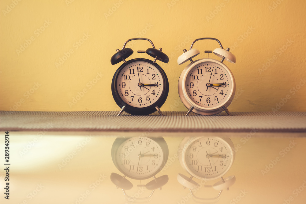 Close up alarm clock with reflection on ground, Vintage Close up alarm clock with reflection on ground, Vintage