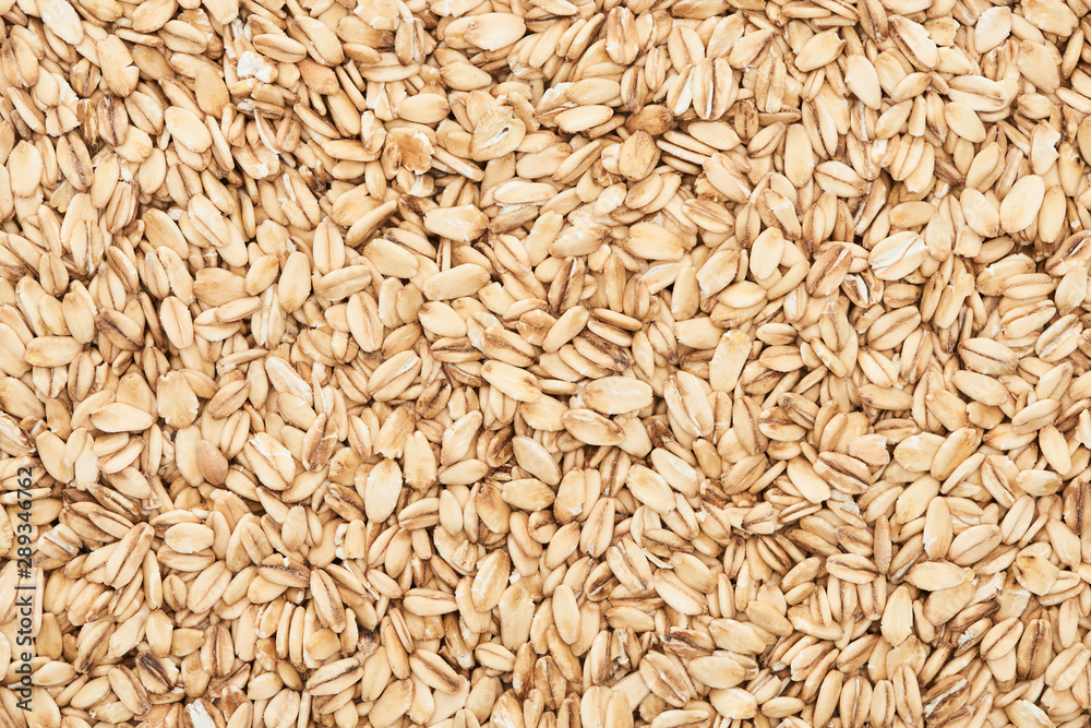 top view of raw pressed organic oats top view of raw pressed organic oats