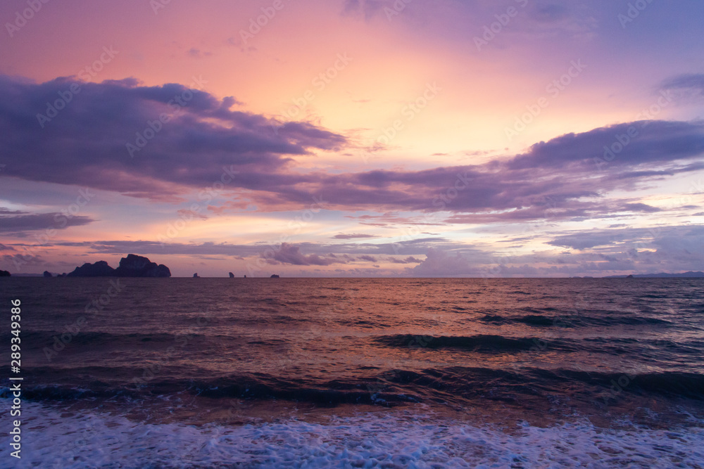 Beautiful sky over the beach scenery with sea view, clouds, and waves. Nature beauty composition.