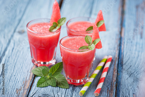 Glasses of watermelon smoothie with mint