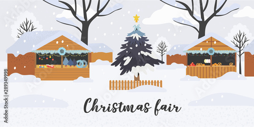 Christmas or new year shopping theme banner, flyer, poster or landing page with christmas market of fair stalls decorated with fir tree branches, wreath, garland and twinkling lights on open air.