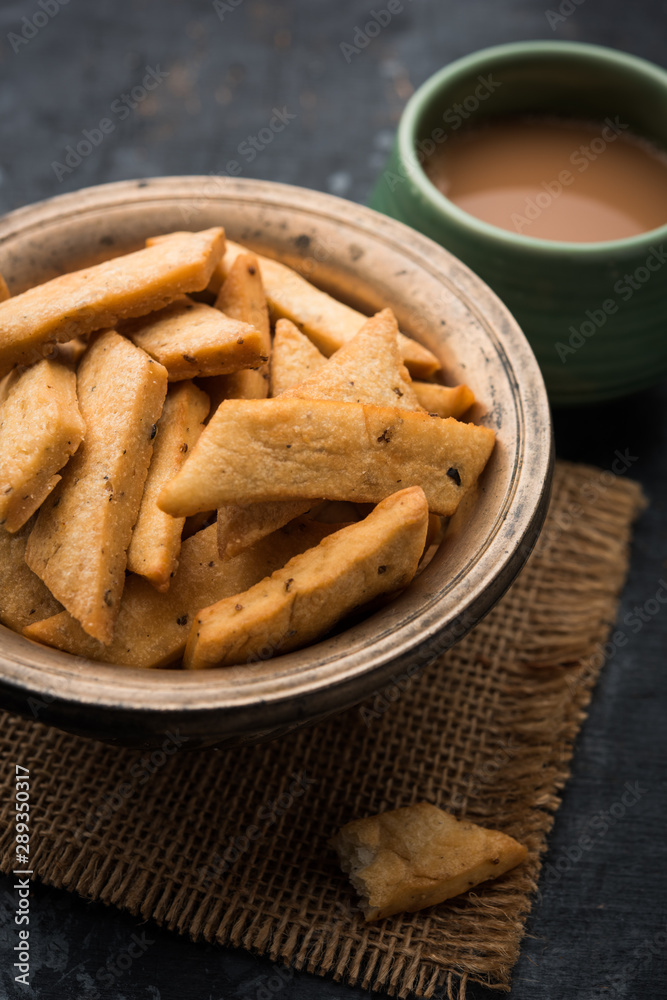 Namakpare or Salty Shakarpara/shakarpare or namkeen Shankarpali, popular diwali food or tea-time snack from Gujarat, India Namakpare or Salty Shakarpara/shakarpare or namkeen Shankarpali, popular diwali food or tea-time snack from Gujarat, India