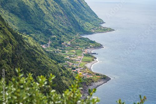 High angle view of the Coastline of Sao Jorge, with cliffs and the famous Fajãs, Sao Jorge Island, Azores Islands, Portugal