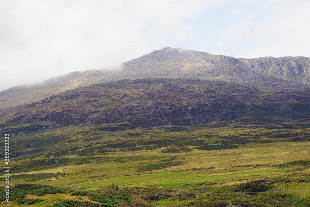 Pastoral Farmland and Mountain Range