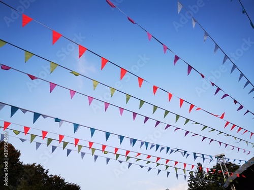 Fotografia Flags garland for fun festa party event, summer holiday farm feast celebration, carnival