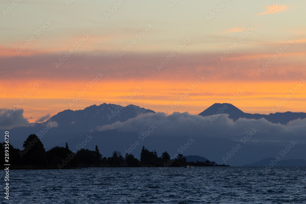 Evening with sunset over Taupo lake, New Zealand Evening with sunset over Taupo lake, New Zealand