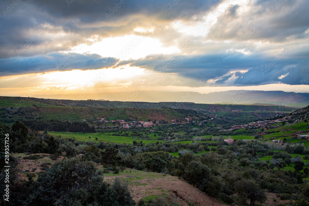 Scenery. Sunset in the clouds against the backdrop of the Atlas Mountains. Morocco Africa