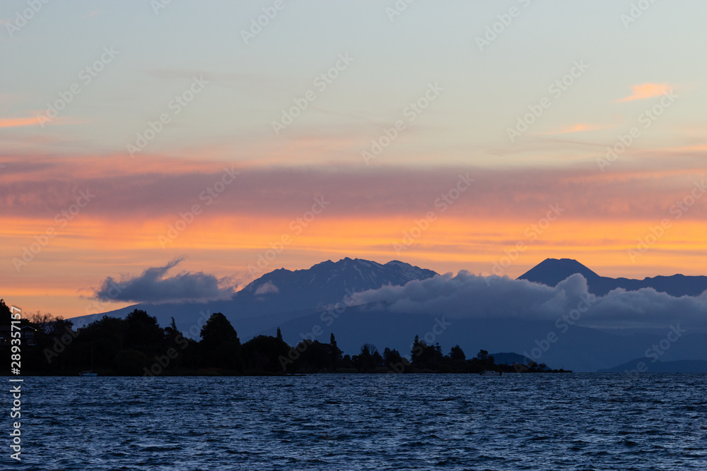 Evening with sunset over Taupo lake, New Zealand Evening with sunset over Taupo lake, New Zealand