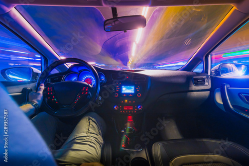 The movement of the car at speed. Blurred background view of the car dashboard.