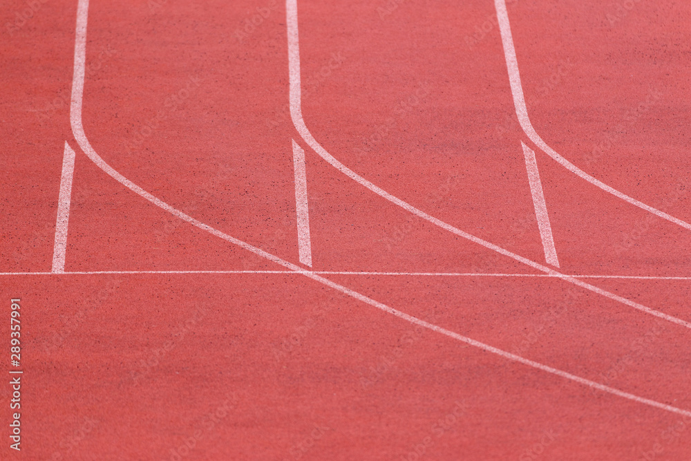 Stadium sport background with copy space. Running track with special cover in pink color for training.