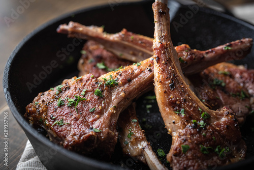 Canvas Print grilled lamb chop on cast iron pan