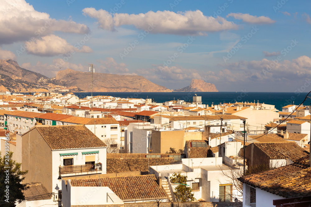 Sea view from the white houses with tiled roofs of the old town in Altea. Spain