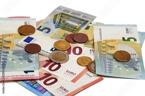 Banknotes of virious value, euro and coins photo