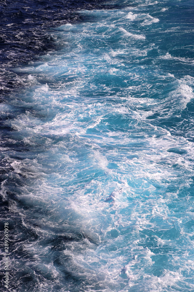 Trace from the motor of a marine vessel on the surface of the sea Trace from the motor of a marine vessel on the surface of the sea