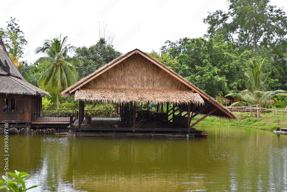 Kanchanaburi, Thailand, 09.09.2019: Beautiful garden, lake, traditional Thai, Siamese clothes, buildings of Kanchanaburi, Thailand, 09.09.2019: Beautiful garden, lake, traditional Thai, Siamese clothes, buildings of