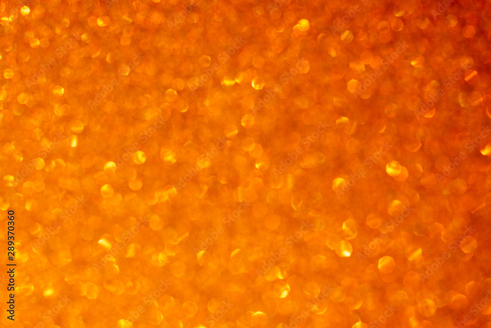orange and gold abstract bokeh lights. defocused background orange and gold abstract bokeh lights. defocused background