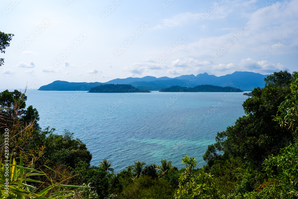 The mountains and sea scenery with blue sky.