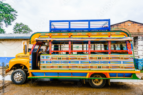 View on Typical colorful chicken bus near Jerico Antioquia, Colombia, South America photo