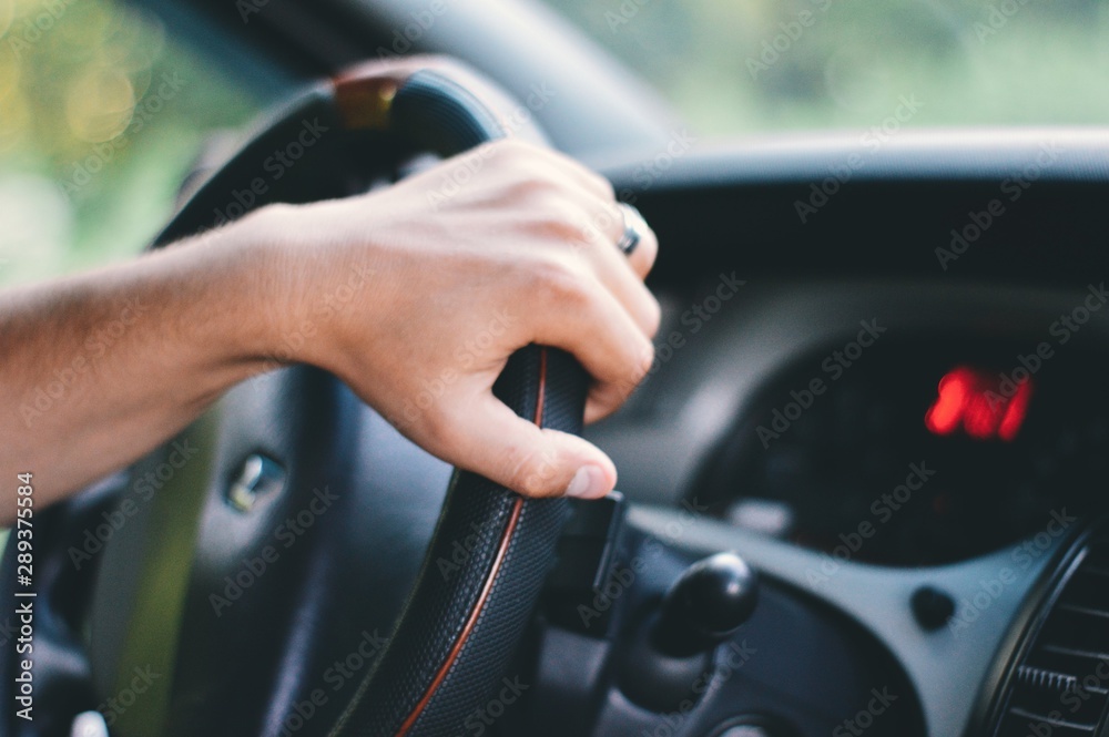 Naklejka premium hand in car