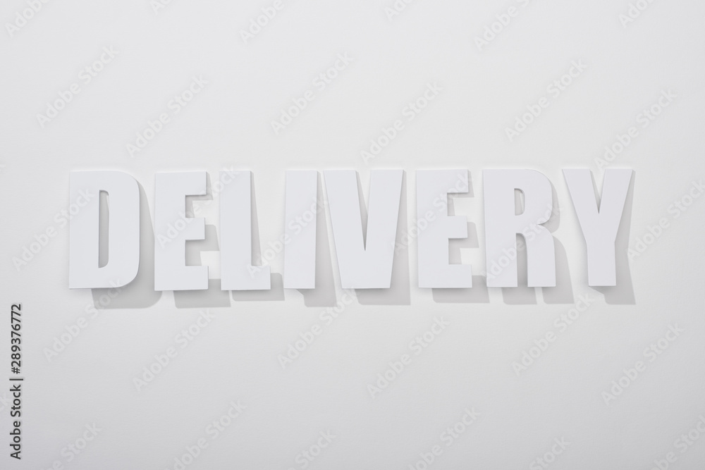 delivery text with shadow on white background with copy space delivery text with shadow on white background with copy space