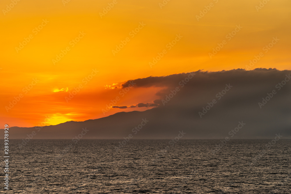 Bataan Province, Philippines - March 5, 2019: Shot 6/6 from Manila Bay on Mount Mariveles, dormant volcano during sunset.