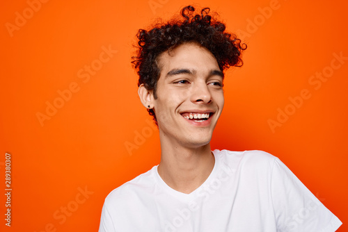 portrait of young man on black background
