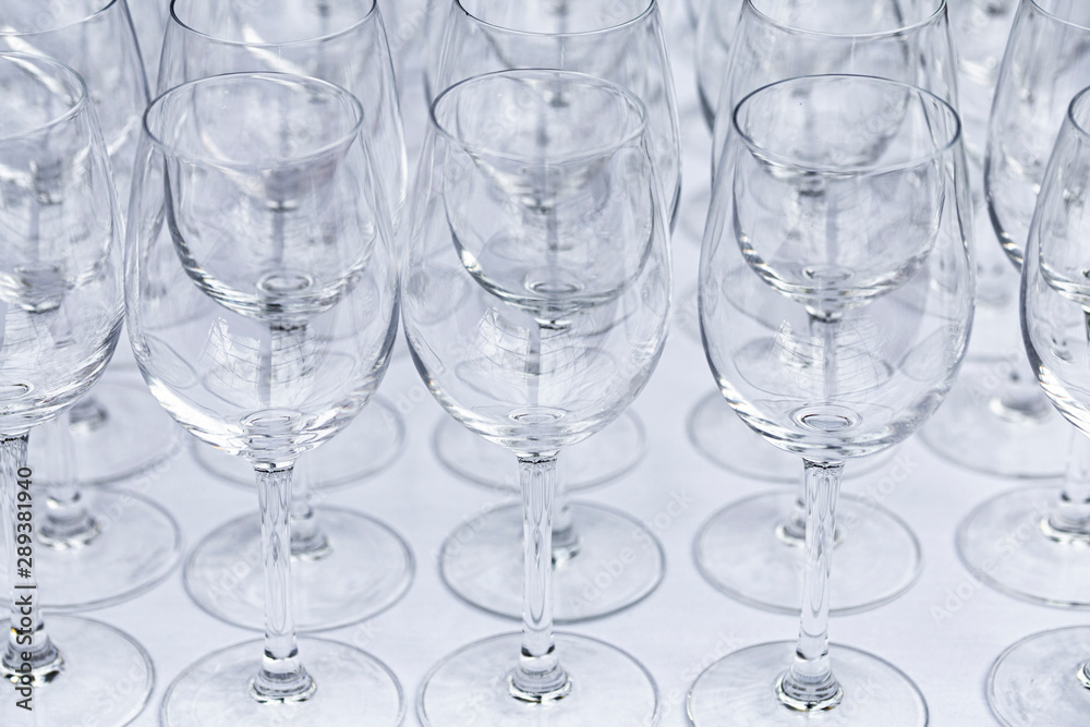 Arrangement of Wine Glasses on White Linen Background Arrangement of Wine Glasses on White Linen Background