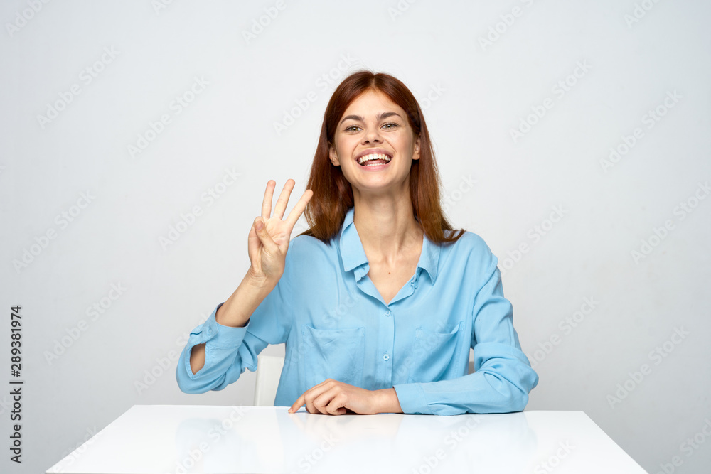 woman sitting on bed and looking at camera woman sitting on bed and looking at camera
