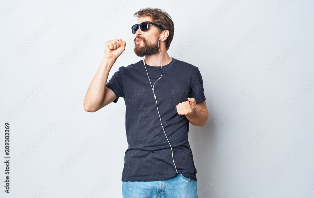 Fototapeta premium young man with headphones listening to music