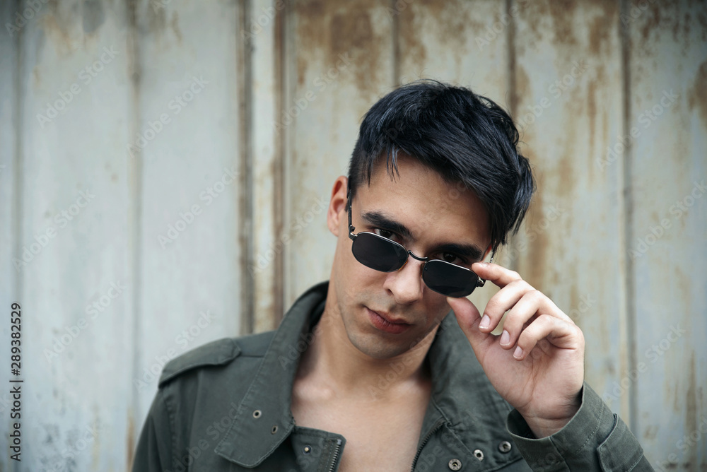 Young handsome man with sunglasses Young handsome man with sunglasses