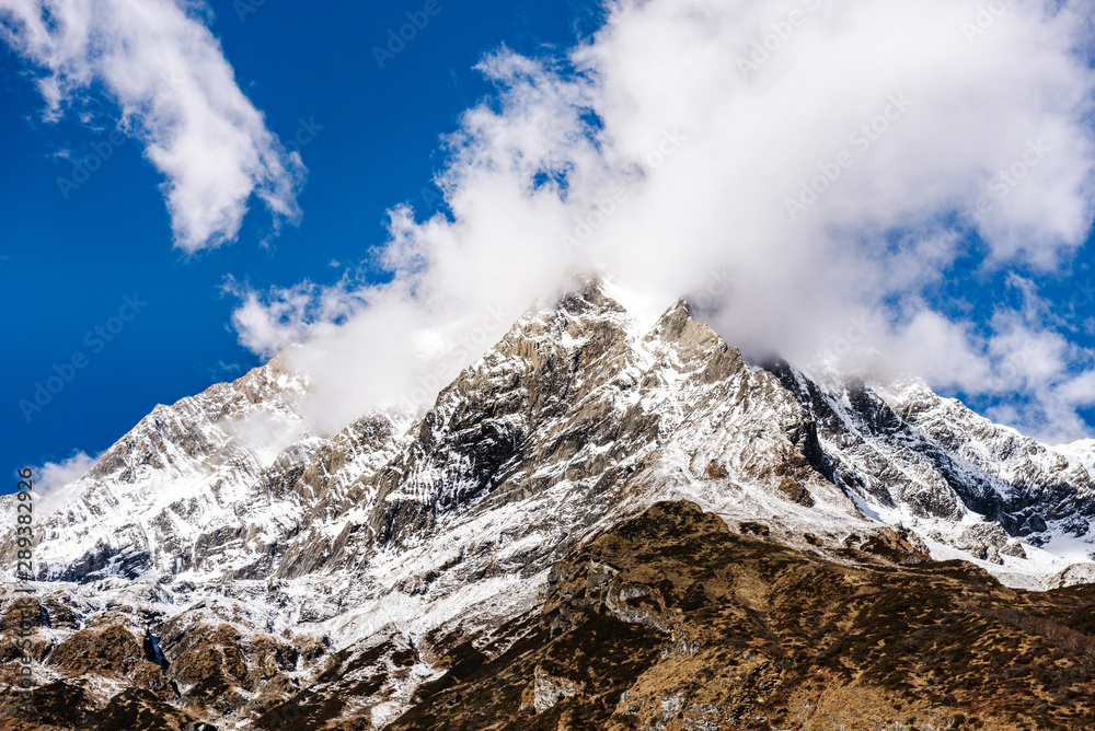 Snow covered mount Manaslu peak in Himalayas,  Nepal.