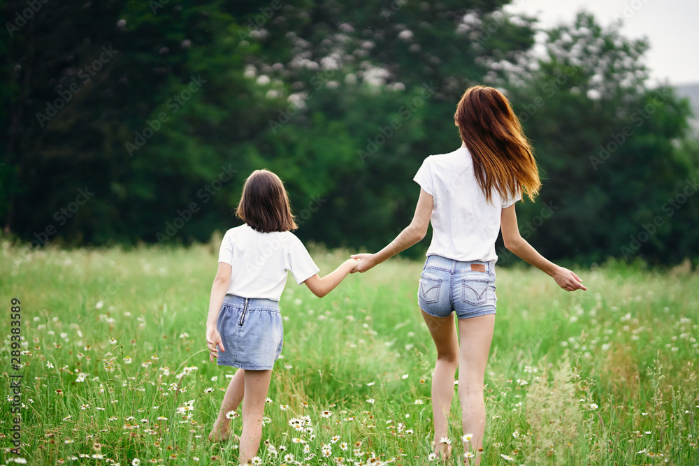 Fototapeta premium mother and daughter in the park