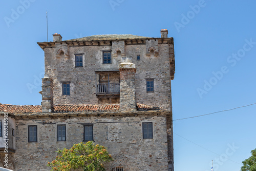 The old tower in town of Ouranopoli, Greece photo