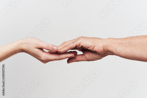 hands of man and woman isolated on white