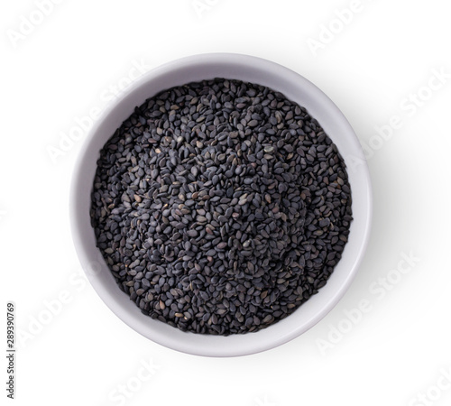 sesame in a bowl isolated on white background. top view