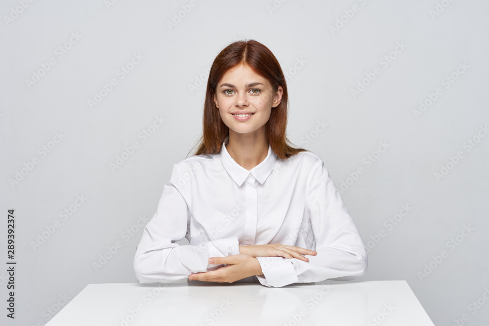 portrait of a young woman in office portrait of a young woman in office