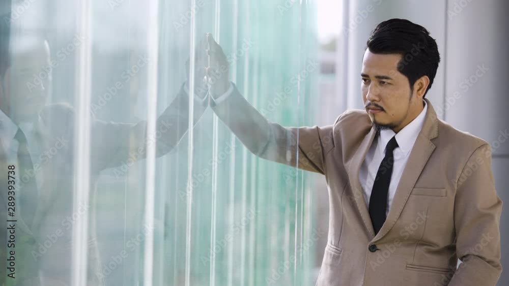 young business man thinking in office young business man thinking in office