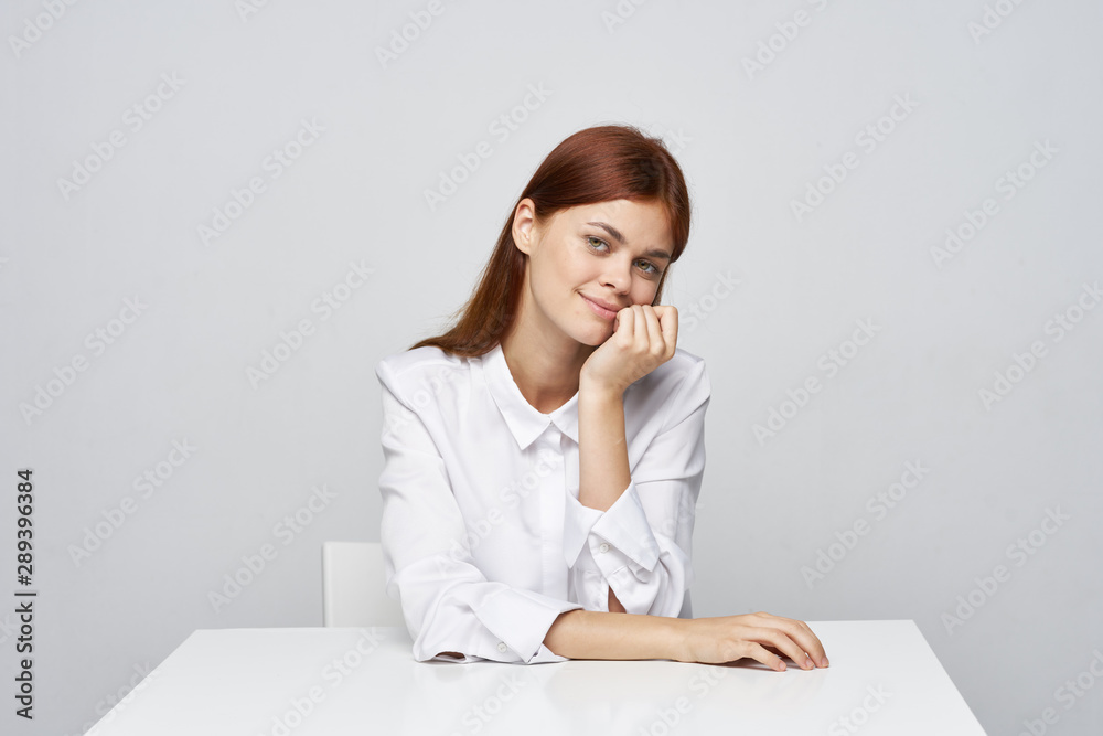 business woman sitting at desk with laptop business woman sitting at desk with laptop