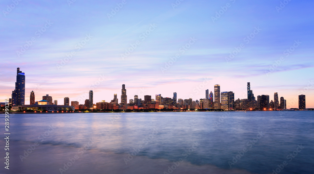 Chicago skyline at sunset with Lake Michigan on the foreground, IL, USA