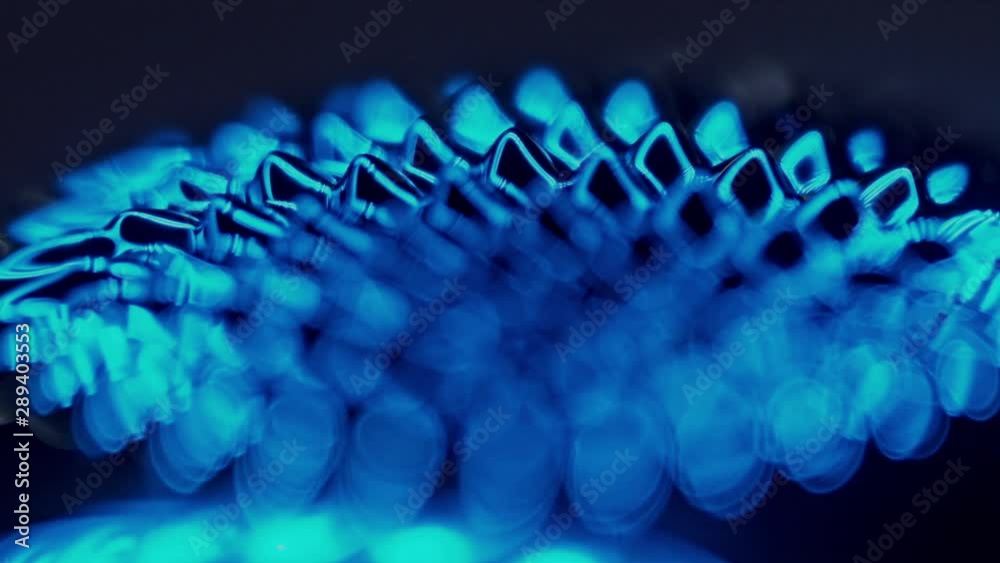 fluid forming spikes in a dark abstract atmosphere