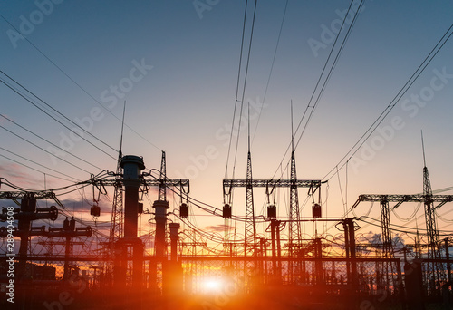High-voltage power lines. Electricity distribution station. high voltage electric transmission tower. Distribution electric substation with power lines and transformers
