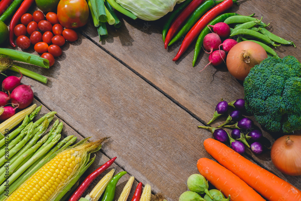 Backgroud of fresh food tasty and healthy varis vegetables are on the wooden table Backgroud of fresh food tasty and healthy varis vegetables are on the wooden table