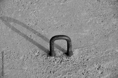 an iron loop in concrete