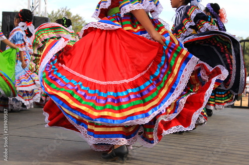 Colorful skirts fly during Mexican dancing