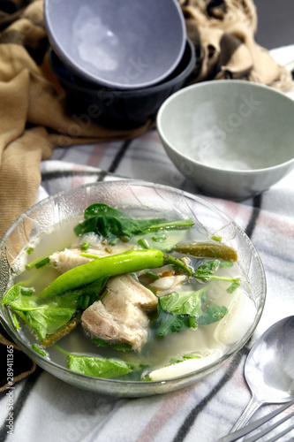 Freshly cooked Filipino dish called pork sinigang or pork cooked in tamarind soup