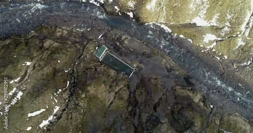 Flying Phantom 4 Pro Drone near  Seljavallalaug public bath  in Iceland photo