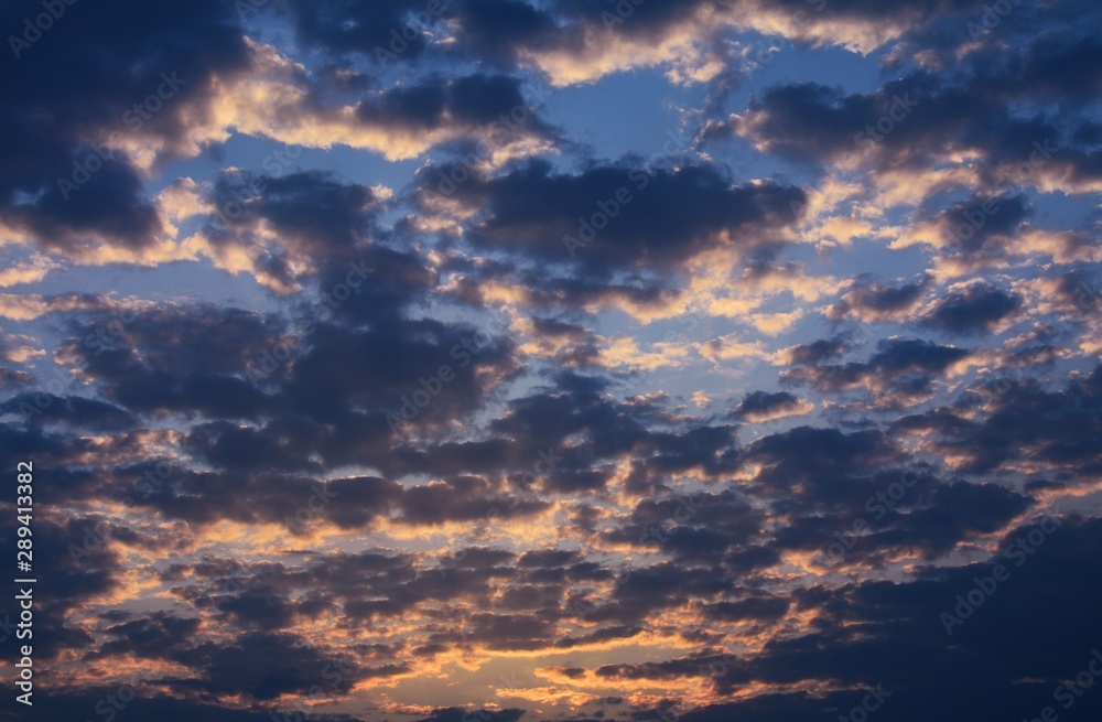 sky with clouds in different shades in the morning